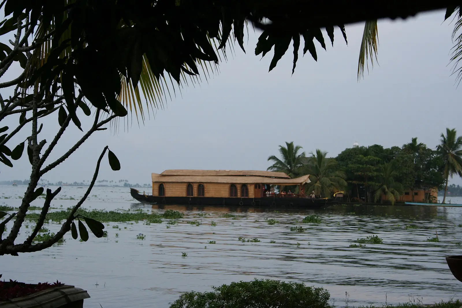 A houseboat on the wide Kerala backwaters